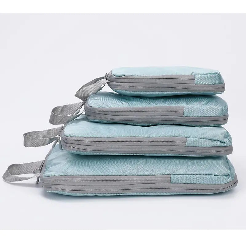 Set 4 bolsas organizadoras de viaje comprimibles e impermeables | Verticales para maleta