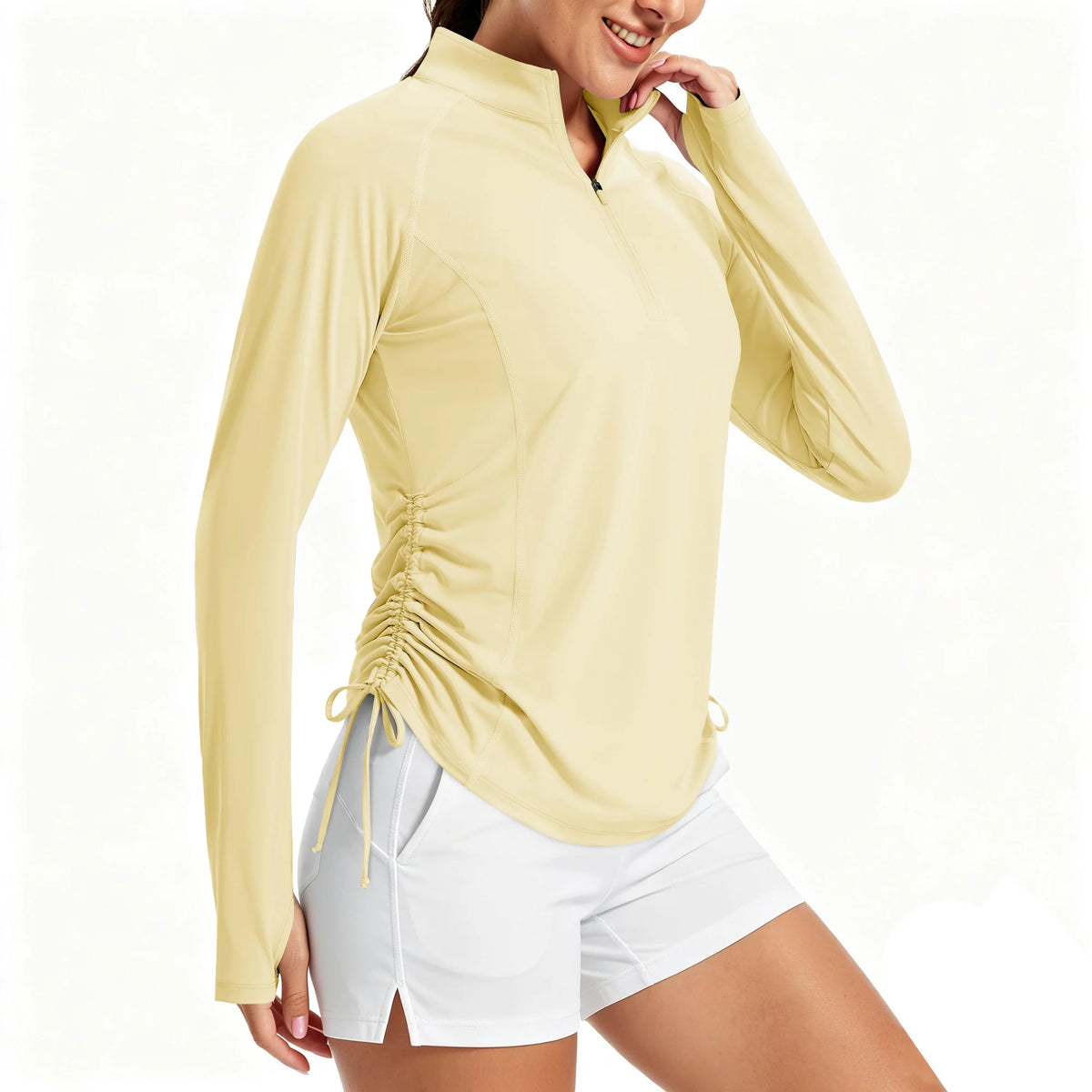 Camiseta para mujer con protección UV UPF50+, manga larga, cremallera corta, cordón lateral, aberturas para los pulgares y tejido transpirable.