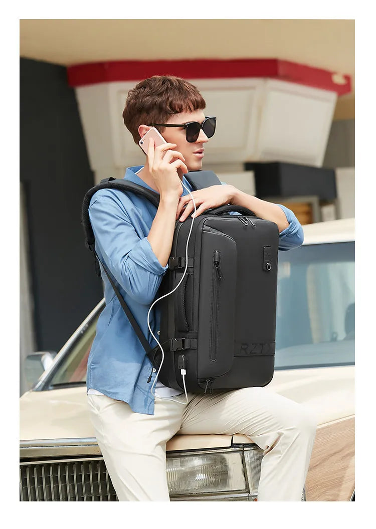 Mochila de viaje con compresión al vacío 60L | Puerto USB y compartimento para portátil