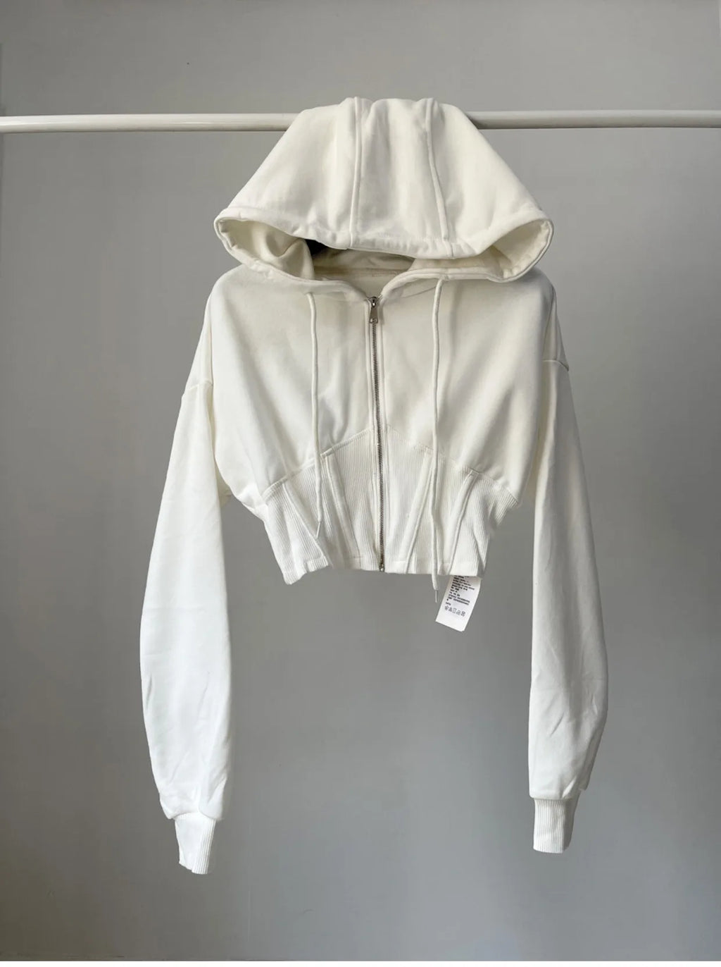 Hoodie corto con cintura ajustada – Mujer