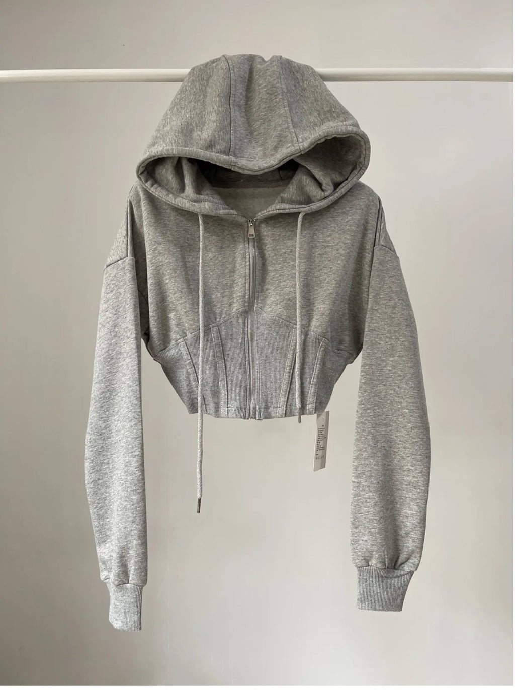 Hoodie corto con cintura ajustada – Mujer